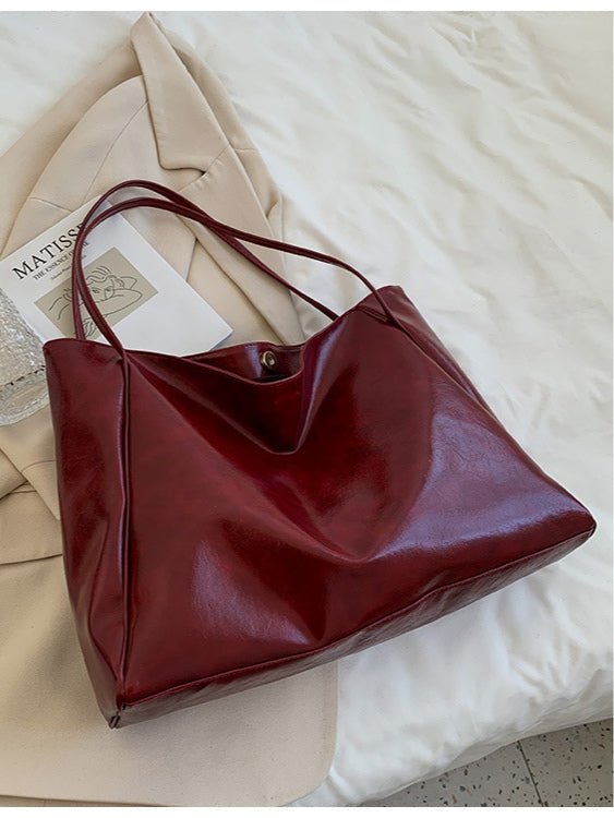 Bolso tipo bucket de cuero suave de gran capacidad
