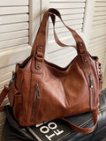 Bolso tote con remaches de gran capacidad