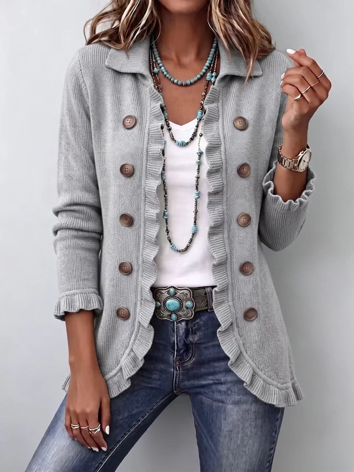 Chaqueta de punto gris jaspeado con volantes