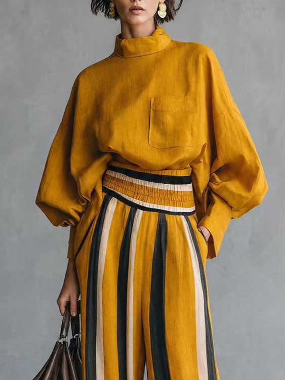 Conjunto de top holgado mostaza y pantalón ancho a rayas