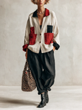 Conjunto de camisa con bloques de color y bolsillos, y pantalón ancho negro