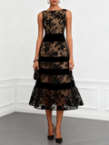 Vestido midi negro de malla floral sin mangas, corte en A