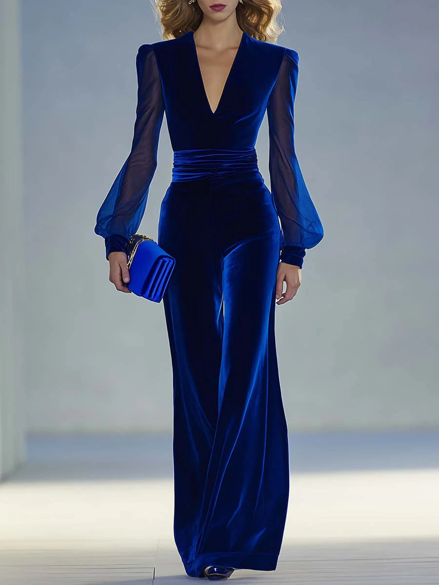 Mono de terciopelo azul real con escote en V y detalles de malla