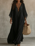 Ambra | Vestido maxi negro con escote en V y mangas murciélago