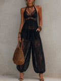 Conjunto negro de top de encaje con espalda descubierta y pantalón tipo harem