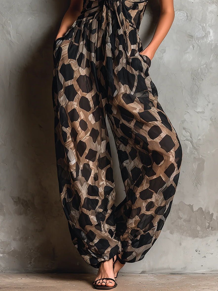 Mono holgado con cuello halter y estampado animal en negro, de pierna ancha