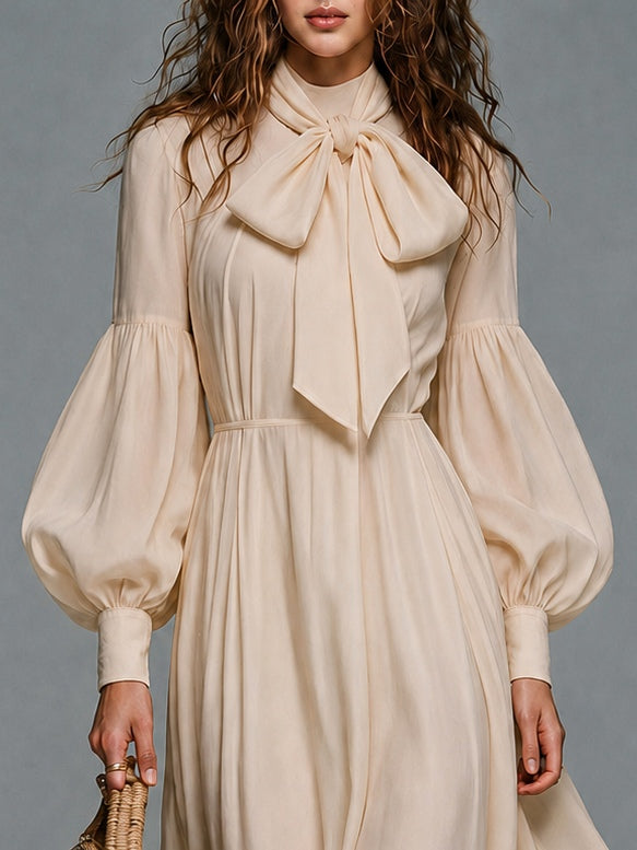 Vestido largo beige de manga larga con cintura elástica y lazo desmontable