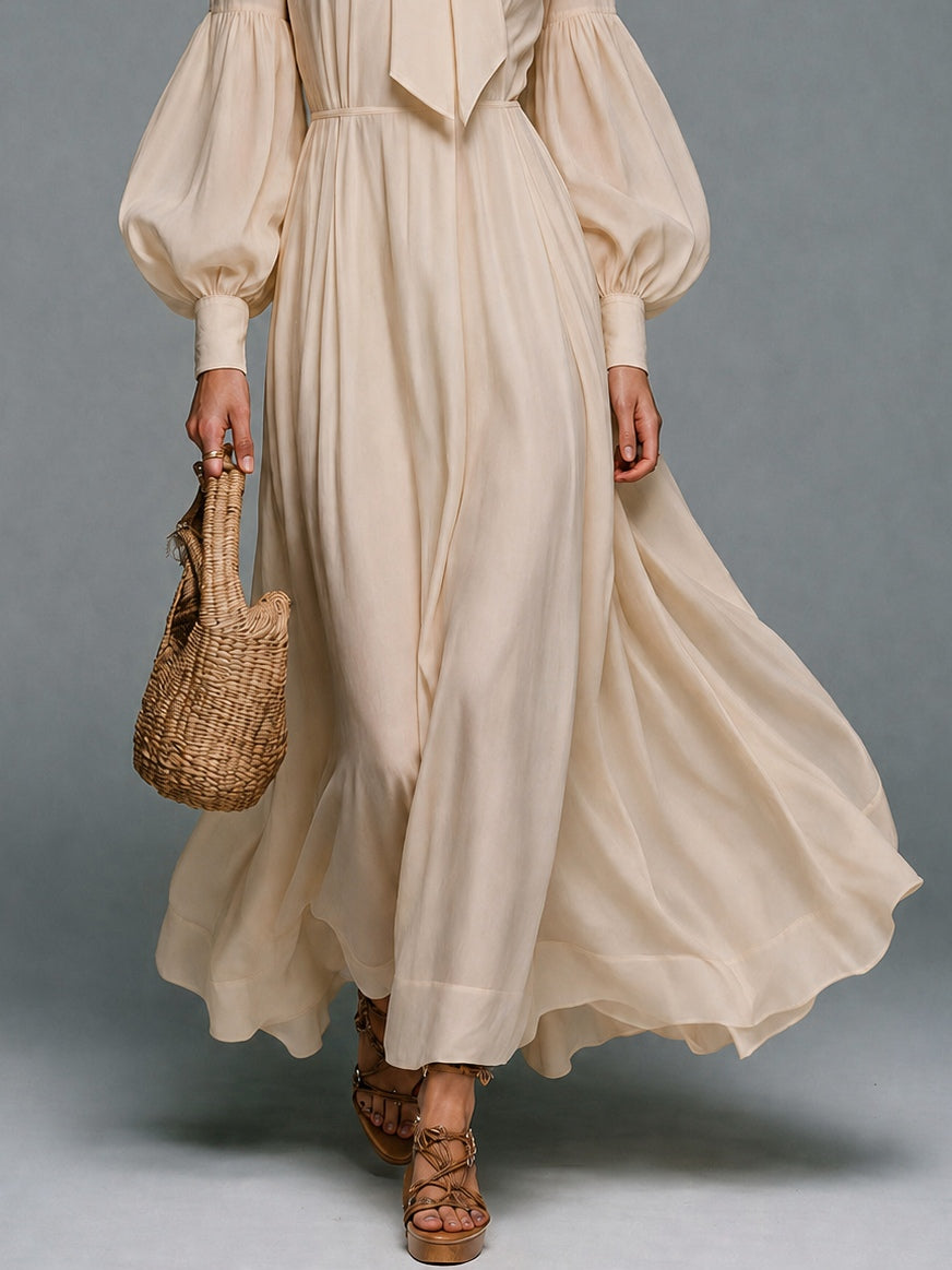 Vestido largo beige de manga larga con cintura elástica y lazo desmontable