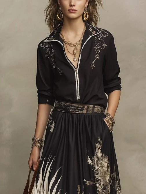 Conjunto Negro de Blusa con Estampado Artístico y Falda Midi Fluida
