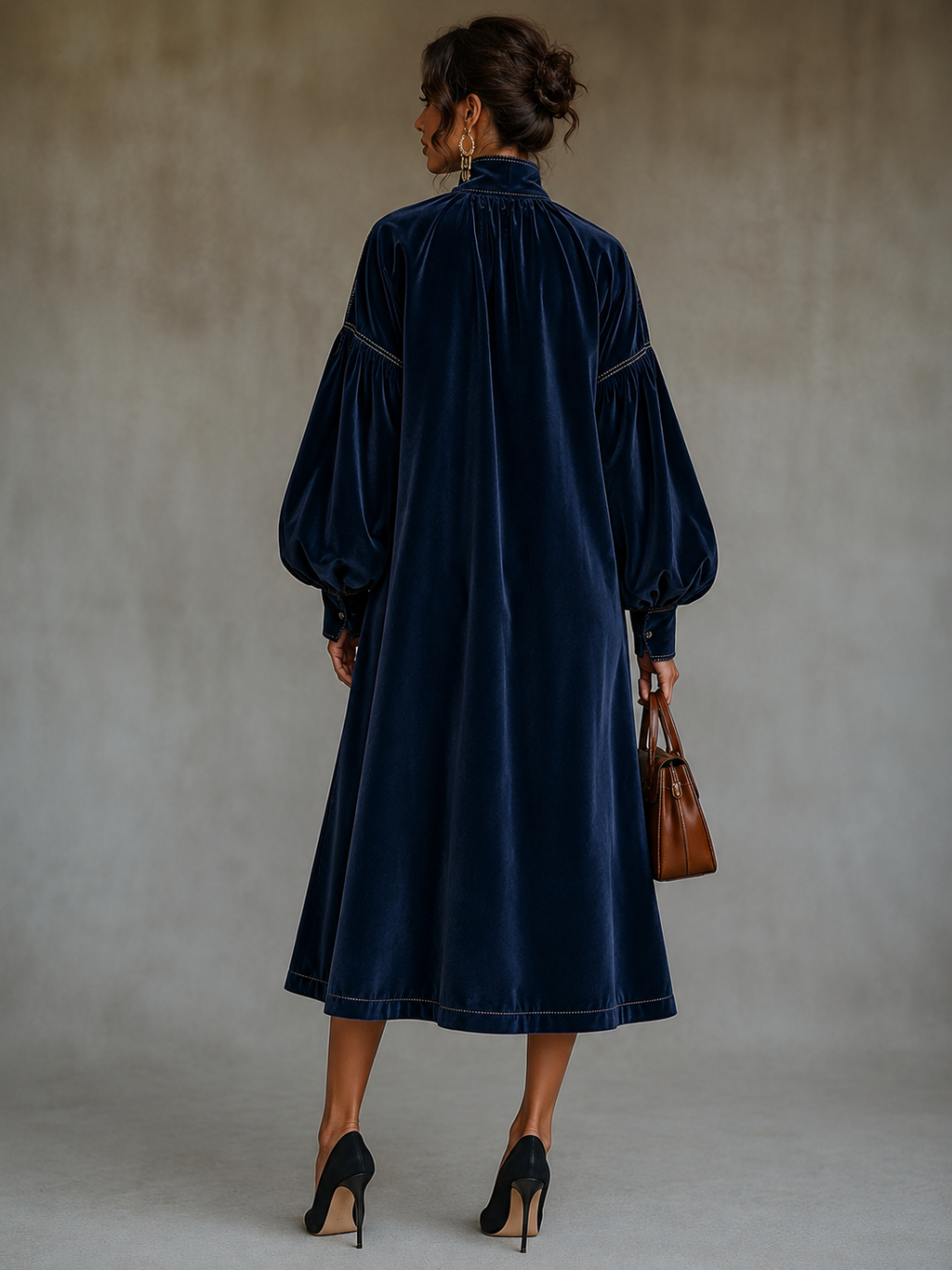 Vestido midi de terciopelo azul marino con lazo y mangas abullonadas