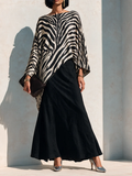Conjunto de top asimétrico con estampado de cebra y falda negra drapeada