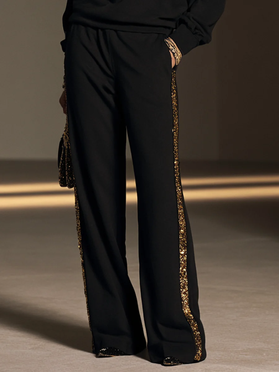 Conjunto de top de cuello barco con cuentas y pantalón ancho en negro y dorado