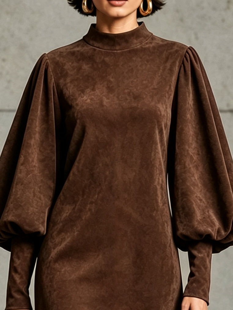 Vestido mini marrón chocolate de ante sintético con mangas abullonadas y bajo con flecos