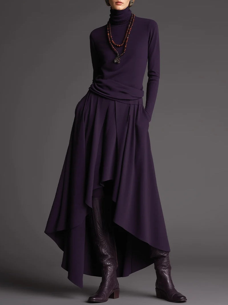 Conjunto morado de top con cuello alto y falda asimétrica