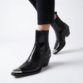Botines western con puntera metálica