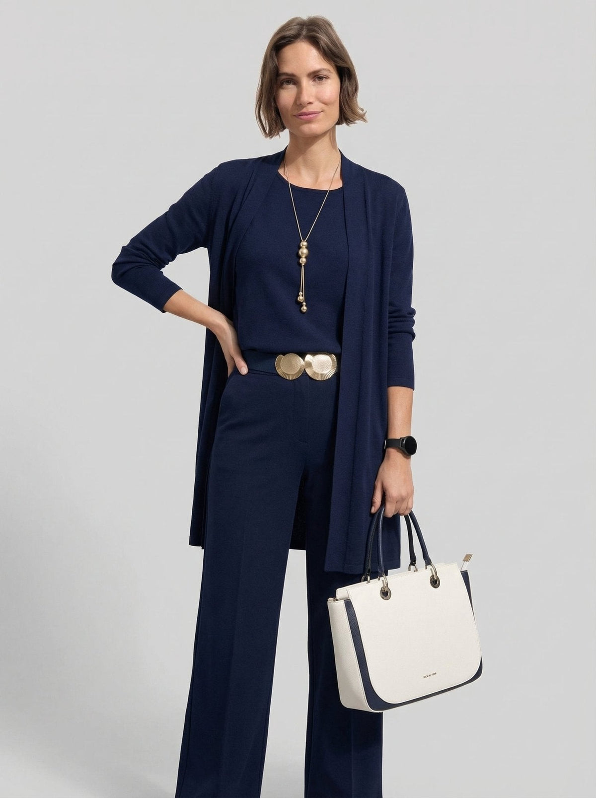 Conjunto de cárdigan largo, top y pantalón