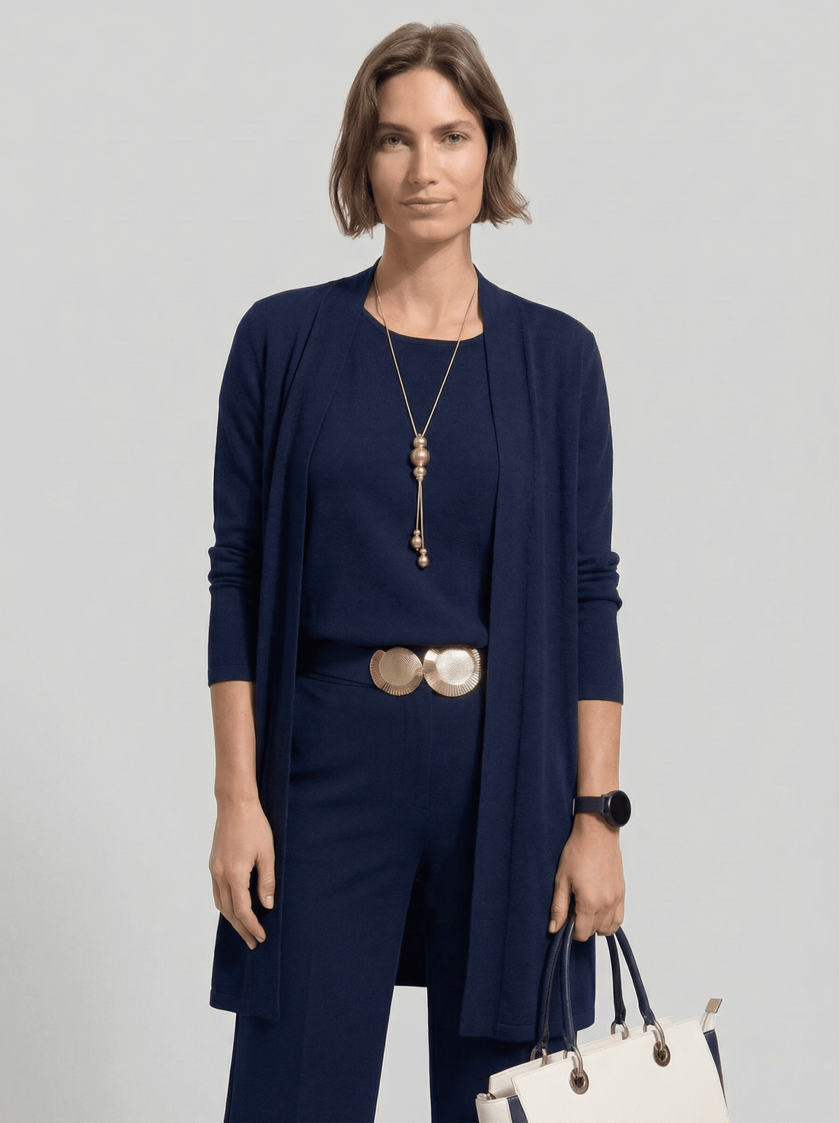 Conjunto de cárdigan largo, top y pantalón