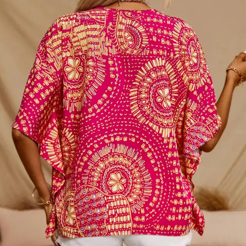 Top vacacional holgado para mujer con cuello de pico, estampado y mangas murciélago