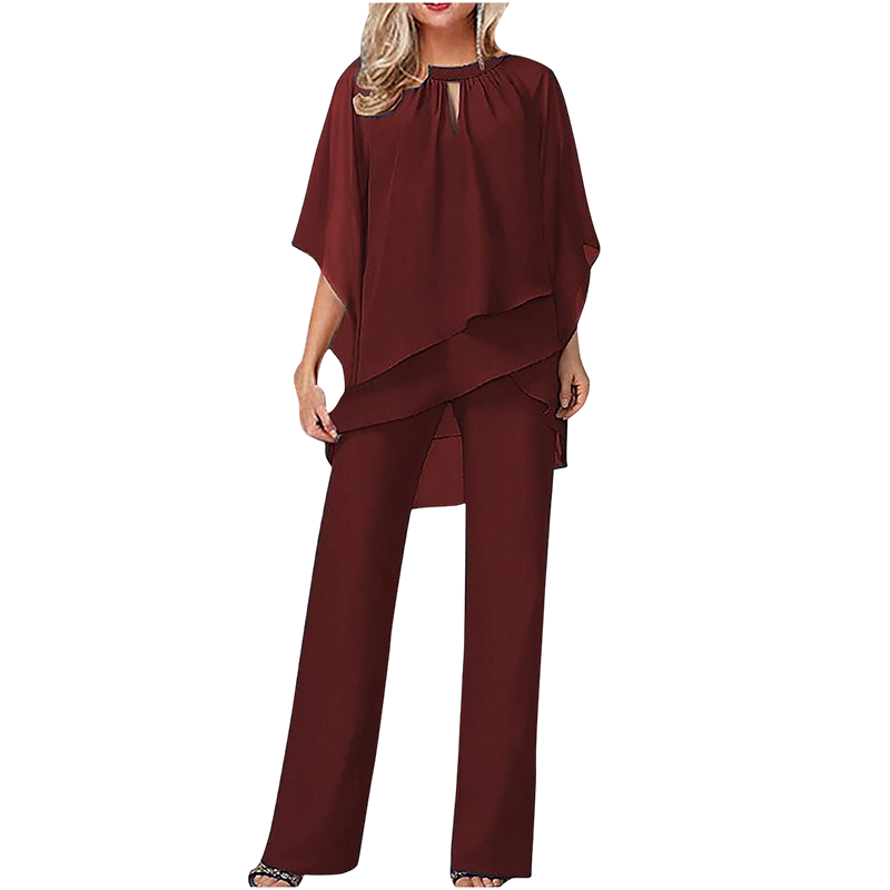 Elegante conjunto de dos piezas: blusa con dobladillo asimétrico y pantalón de pierna ancha